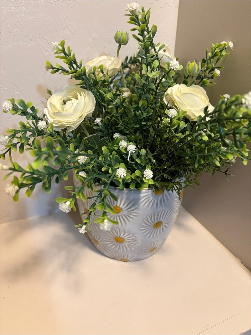Cream Ranunculus and Greenery in Daisy-Pattern White Ceramic Pot